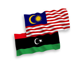 Flags of Libya and Malaysia on a white background