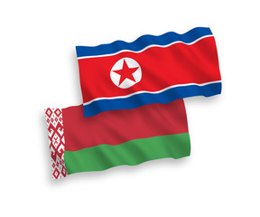 Flags of North Korea and Belarus on a white background