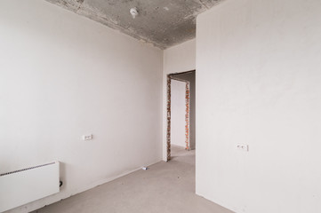 Russia, Moscow- August 05, 2019: interior room apartment rough repair for self-finishing. interior decoration, bare walls of the room, stage of construction