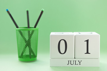 Desk calendar of two cubes for July 1