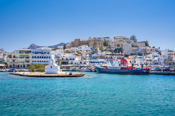 Chora of Naxos island as seen from the famous landmark the Portara with the natural stone walkway...
