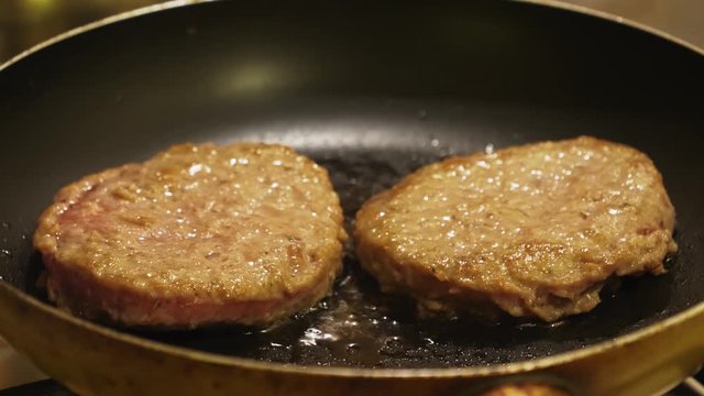 Cooking cutlets for burgers, close up view