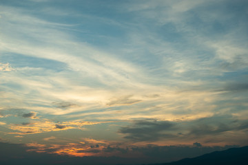Fototapeta na wymiar sunlight through cloud on dramatic sunset sky