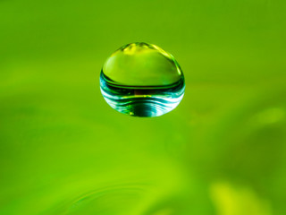 Green drop of water
