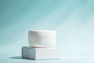 Face and body skin care cream butter with marine minerals. Copy space.