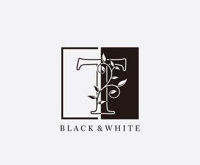 Vintage T Letter Leaves Logo. Black and White T With Classy Leaves Shape Logo Design