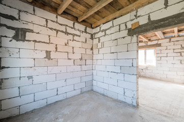 Russia, Moscow- August 05, 2019: interior room rough repair for self-finishing. interior decoration, bare walls of the room, stage of construction