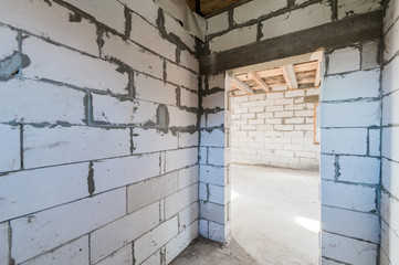 Russia, Moscow- August 05, 2019: interior room rough repair for self-finishing. interior decoration, bare walls of the room, stage of construction
