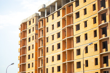 abandoned construction of a multi-storey building, illegal real estate busines