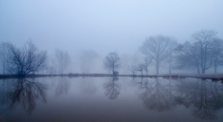Winter fog on a small lake or pond