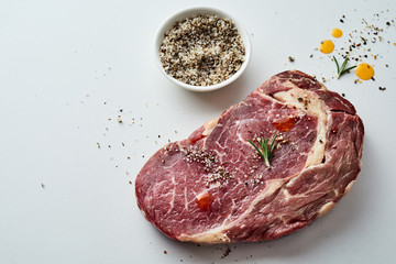 Portion of fatty marbled raw beef steak