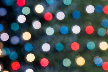 background of abstract glitter lights. Red, yellow, blue, gold and black. defocused