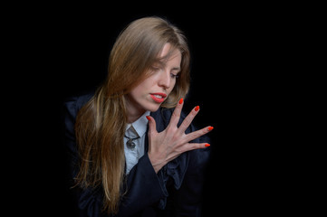 woman looks at her five fingers