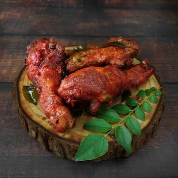 Fried Chicken On The Copping Board. Malaysia People Called Ayam Goreng Mamak.