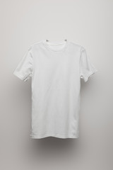 blank basic grey t-shirt on grey background