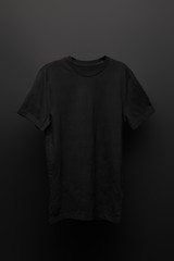 blank basic black t-shirt on black background