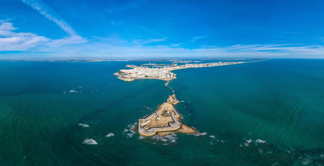 Panoramic aerial view of the city of Cadiz and the Castle of San Sebastian. Spain - obrazy, fototapety, plakaty