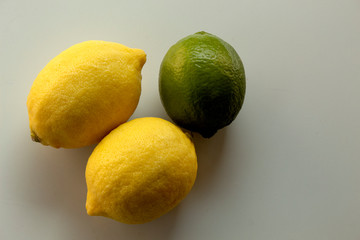 lemons and limes on white background