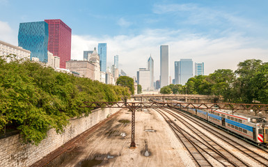 Fototapeta premium View of Chicago Downtown Skyline with railroad yard under bridge, USA