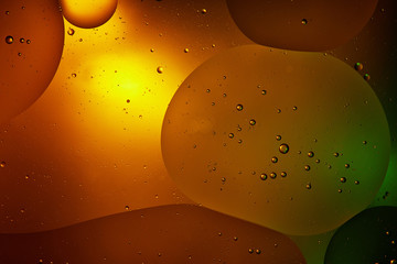 Beautiful orange color abstract background from mixed water and oil