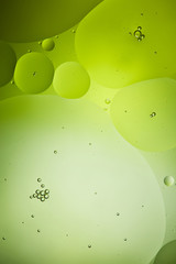 Beautiful green color abstract background from mixed water and oil