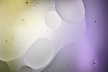 Beautiful purple and green color abstract background from mixed water and oil