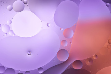 abstract purple and pink color texture from mixed water and oil bubbles