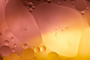 Beautiful orange and pink color abstract background from mixed water and oil