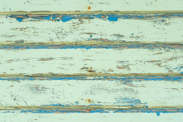 Fototapeta na wymiar Wood board with peeling paint