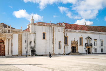 Student walking in University of Coimbra, Portugal