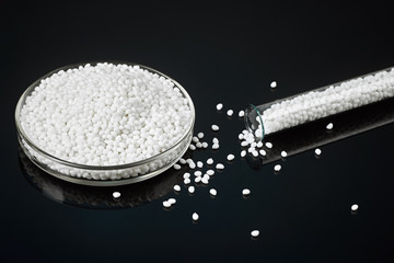 Closeup of a white plastic polymer in granules