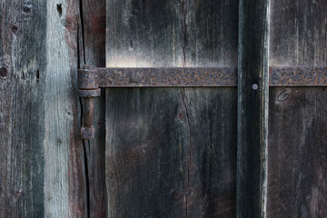 old wooden door with lock, &aring;re, j&auml;mtland, sweden