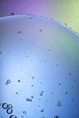 Beautiful abstract background from mixed water and oil in light blue color