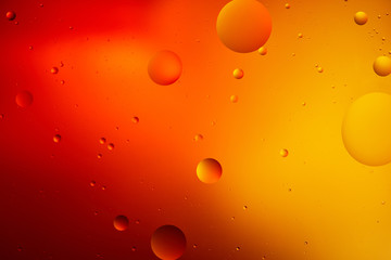 abstract macro orange and red color background from mixed water and oil