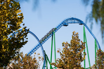 Climb up on a roller coaster. Amusement Park in Turkey Park of Legends. Against the blue sky.