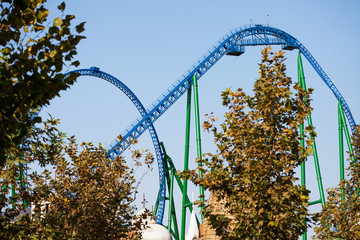 American extreme roller coaster. Amusement Park in Turkey Park of Legends. Against the blue sky.