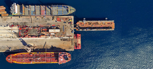 Aerial drone ultra wide photo of old industrial shipyard in Mediterranean destination