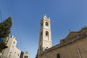 Fototapeta premium St. Nicholas church bell tower in Bay Jala - a suburb of Bethlehem in Palestine