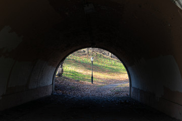 Dark Tunnel and Street Light at Riverside Park on the Upper West Side of New York City during Autumn