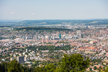 Panoramaof old downtown of Zurich city, with beautiful house at the bank of Limmat River, aerial view from the top of Mount Uetliberg