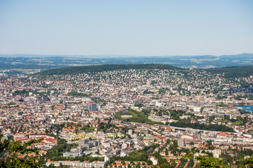Fototapeta na wymiar Panoramaof old downtown of Zurich city, with beautiful house at the bank of Limmat River, aerial view from the top of Mount Uetliberg