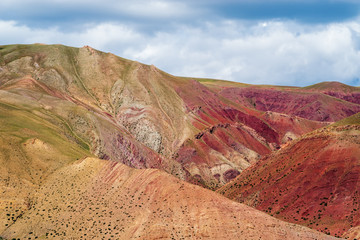 Colorful hillsides in the natural boundary Kyzylshin. Kosh-Agachsky District, Altai Republic, Russia