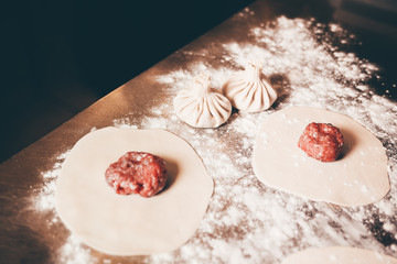 Khinkali cooking process. Georgian national cuisine