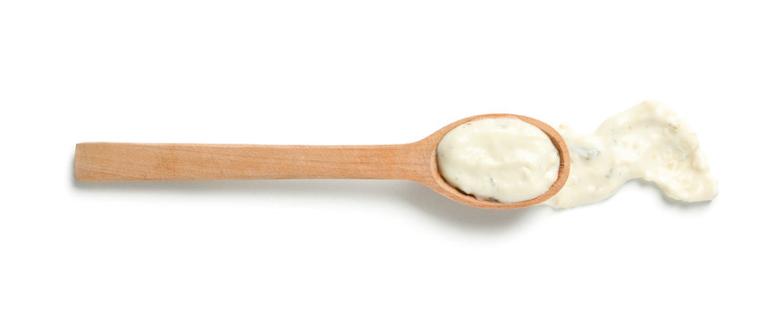 Wooden Spoon With Sauce Isolated On White Background