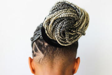 Young afro with blonde Box braids, African hair style also known as 