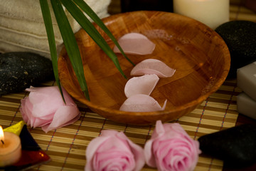 soap rose petals in a wooden bawl