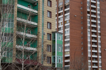 Fototapeta premium Contemporary apartment building. Grunge cityscape.