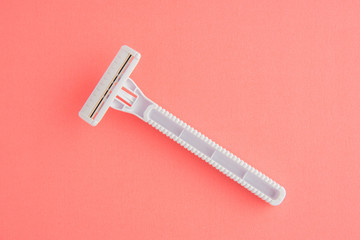 Plastic Razor Isolated On Pink Background, White Plastic Razor