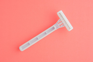 Plastic Razor Isolated On Pink Background, White Plastic Razor