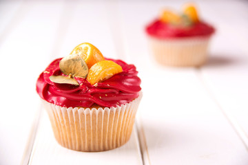 Cupcake decorated with kumquat for Valentine day celebration. Birthday cupcake